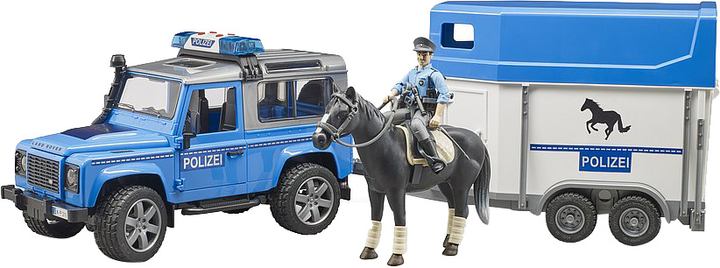 Ігровий набір Bruder Land Rover Defender з причепом і фігурка поліцейського з конем (254041986) - зображення 1