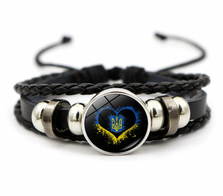 Патріотичний плетений браслет з національною символікою - Тризуб в жовто-блакитному сердечку на шнурівці - Фото 1 Патріотичний плетений браслет з національною символікою - Тризуб в жовто-блакитному сердечку на шнурівці - изображение 1