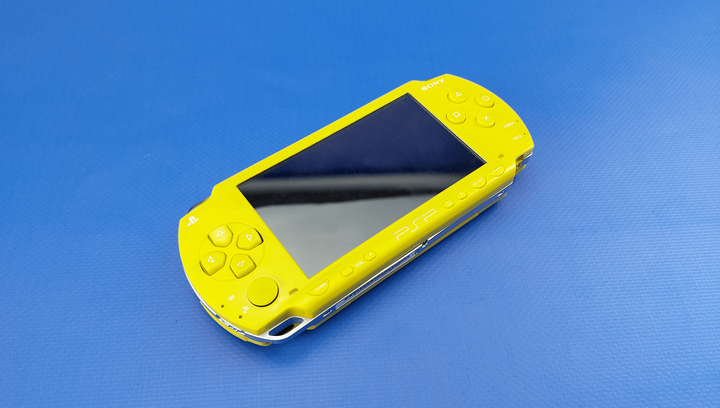 Консоль Sony PlayStation Portable FAT PSP-1ххх Yellow Б/У – фото