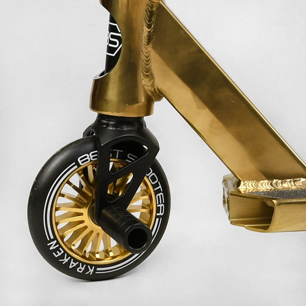 Трюковий самокат Best Scooter Kraken KR-93091 з кермовою системою HIC, колеса 110 мм, анодоване фарбування + 2 пеги, Золотистий - Фото 6 Трюковий самокат Best Scooter Kraken KR-93091 з кермовою системою HIC, колеса 110 мм, анодоване фарбування + 2 пеги, Золотистий - зображення 6