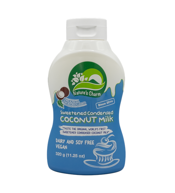 Кокосове згущене молоко веганське в пластиковій пляшечці Nature's Charm Sweetened Condensed Coconut Milk 320 г - Фото 1 Кокосове згущене молоко веганське в пластиковій пляшечці Nature's Charm Sweetened Condensed Coconut Milk 320 г - зображення 1