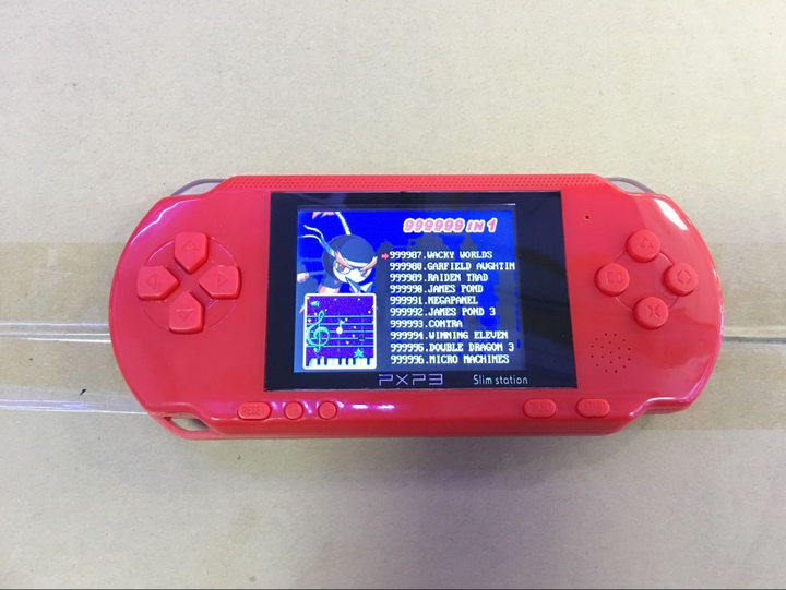 Портативная игровая ретро приставка с LCD экраном 2.7" UTM PXP3 16bit с подключением к ТВ + картридж с играми Красная - изображение 11