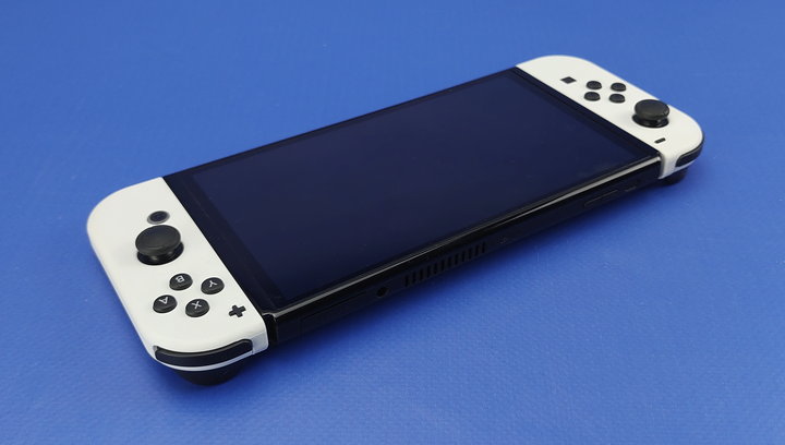 Nintendo Switch ホワイト/ブラック 本体 Консоль Nintendo Switch OLED Model HEG-001 64GB White – фото