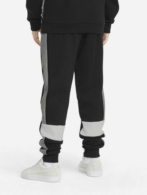 Dziecięce spodnie dresowe ciepłe polarowe dla chłopca Puma Ess+ Colorblock Pants Fl Cl B 849083-01 104 cm Czarne (4064535821499) - obraz 2