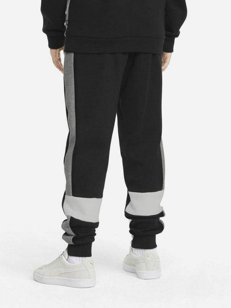 Дитячі теплі спортивні штани на флісі для хлопчика Puma Ess+ Colorblock Pants Fl Cl B 849083-01 104 см Чорні (4064535821499) - зображення 2