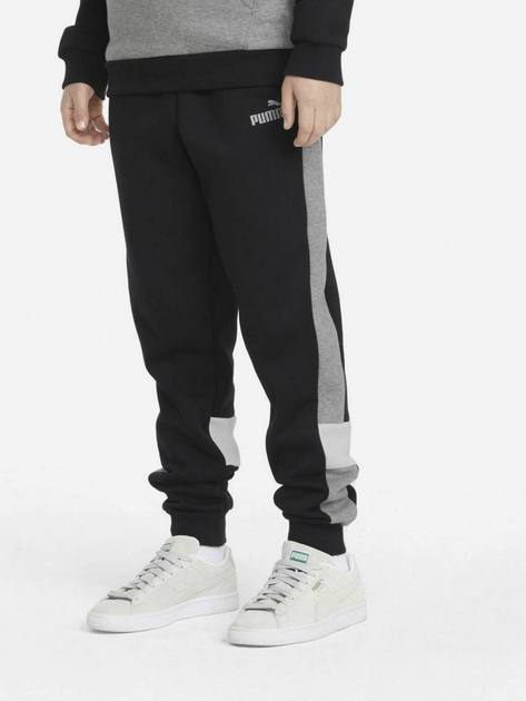 Dziecięce spodnie dresowe ciepłe polarowe dla chłopca Puma Ess+ Colorblock Pants Fl Cl B 849083-01 116 cm Czarne (4064535821512) - obraz 1