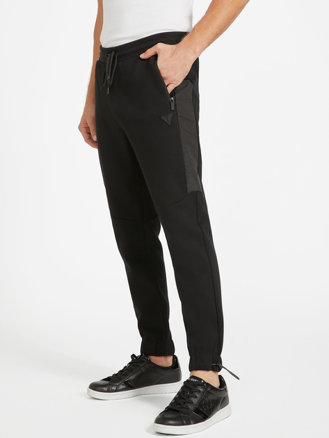 Spodnie dresowe męskie Guess X3GQ04K9PM0-BLK 2XL Czarne (7622078152813) - obraz 4