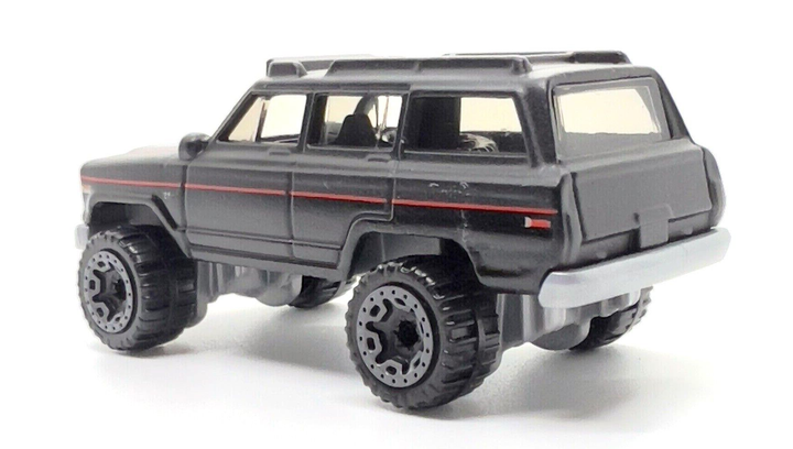 Машинка Базова Hot Wheels 1988 Jeep Wagoneer The `80S 1:64 HKJ63 Black 1шт - зображення 6