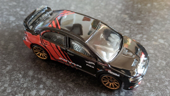 Машинка Базовая Hot Wheels 2008 Lancer Evolution Speed Graphics 1