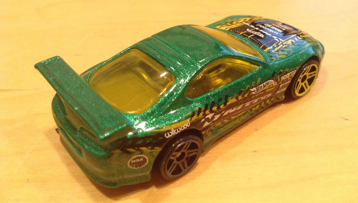 Машинка Базова Hot Wheels Toyota Supra Speed Graphics 1:64 DHR73 Green - Фото 4 Машинка Базова Hot Wheels Toyota Supra Speed Graphics 1:64 DHR73 Green - зображення 4