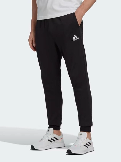 Спортивні штани чоловічі Adidas M Feelcozy Pant HL2236 XL Чорні (4066747845102) - зображення 1
