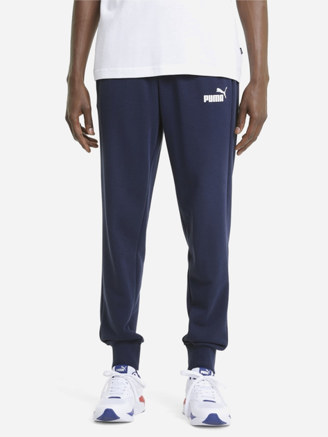 Спортивні штани чоловічі Puma Ess Logo Pants Tr Cl 58671606 XL Темно-сині (4063697296893) - зображення 1