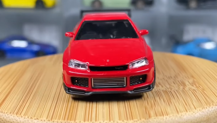 Машинка Premium MINI GT Nissan Skyline GT-R (R34) Tommykaira R-z 1