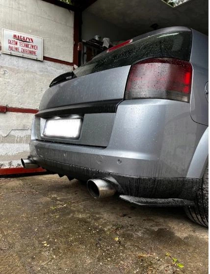 Накладка на задній бампер Opel Vectra C акулі плавці канарди універсальна чорного кольору - зображення 3