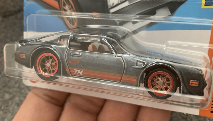 Машинка Базова Hot Wheels '77 Pontiac Firebird T/A Super