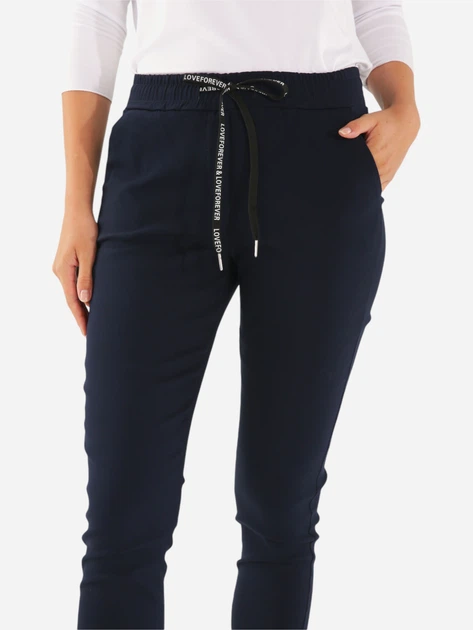 Spodnie slim fit damskie Unisono 224-5598 M Granatowe (5906140650820) - obraz 3