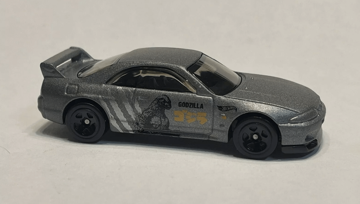 Машинка Базова Hot Wheels Nissan Skyline GT-R R33 Godzilla J-Imports 1:64 HTD96 Grey - зображення 3