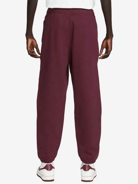 Spodnie sportowe męskie Nike DX1364-681 M Bordowe (196607389164) - obraz 2