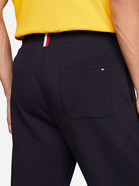 Spodnie dresowe męskie Tommy Hilfiger MW0MW08388-DW5 M Ciemnogranatowe (8720111201449) - obraz 4
