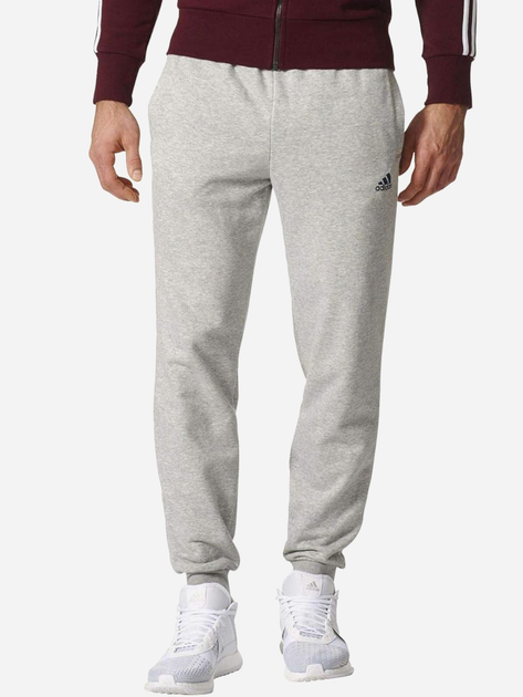 Spodnie dresowe męskie adidas Ess T Pnt Ft BK7432 2XL/S Szare (4058023662541) - obraz 1