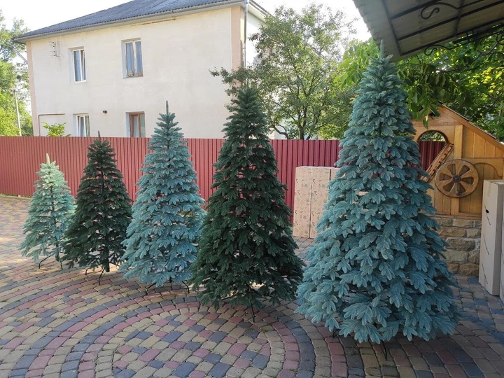 Штучна лита новорічна ялинка Швейцарська 1.50 м з пластику діаметром 100см 15 рядів складна ялинка з підставкою Зелений - зображення 11