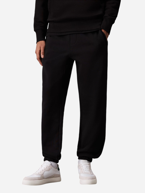 Spodnie sportowe męskie joggery Calvin Klein J30J326401-BEH XL Czarne (8720639290635) - obraz 1