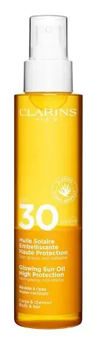 Солнцезащитное масло-спрей для тела Clarins Glowing Sun Oil High Protection SPF 30 150ml - Фото 1 Солнцезащитное масло-спрей для тела Clarins Glowing Sun Oil High Protection SPF 30 150ml - изображение 1