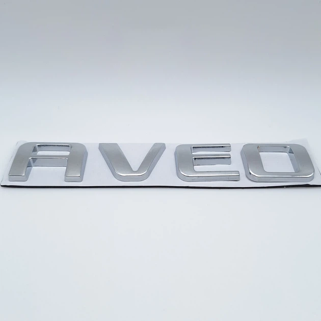 Емблема напис Aveo Chevrolet (хром, глянець) 12,3*2,1 см - Фото 4 Емблема напис Aveo Chevrolet (хром, глянець) 12,3*2,1 см - зображення 4