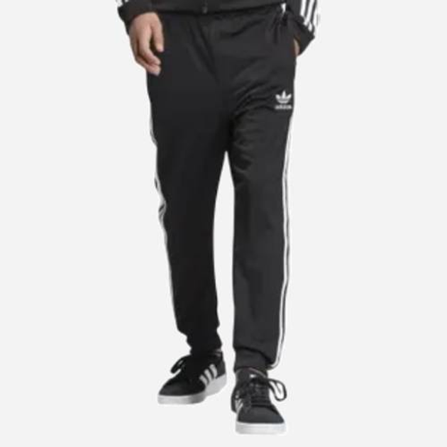 Spodnie dresowe młodzieżowe chłopięce Adidas Superstar Pants DV2879 140 cm Czarne (4060515179543) - obraz 1