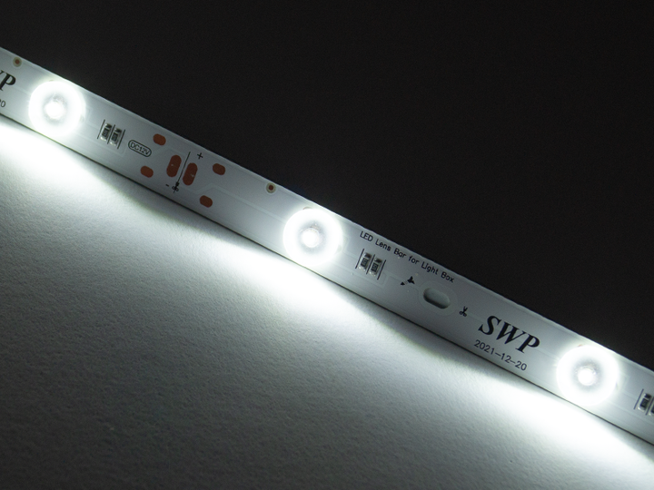 Світлодіодна лінійка з лінзою SWP SMD3030 12 LED 12В 14Вт IP20 6000K 1000мм - Фото 2 Світлодіодна лінійка з лінзою SWP SMD3030 12 LED 12В 14Вт IP20 6000K 1000мм - зображення 2