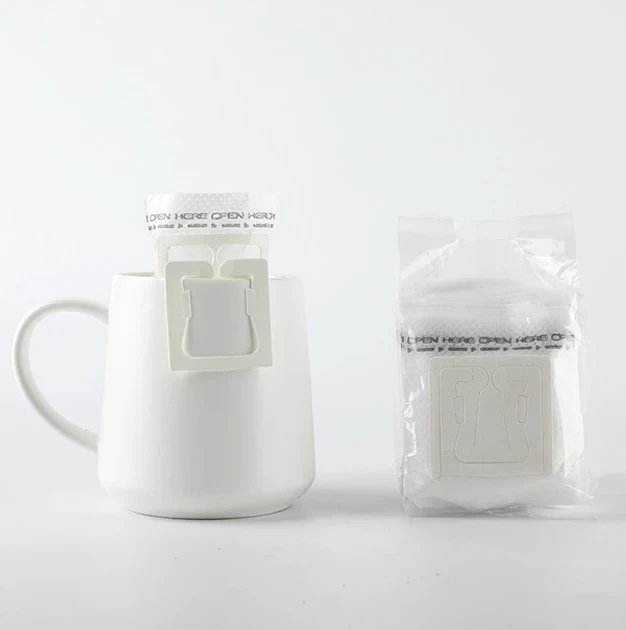 Дріп пакети для кави фільтр для заварювання пакетики drip bag filters порційні кавові фільтри порожні одноразові з вушками на чашку 100 шт паперові біорозкладні в чашці швидке заварювання вдома в офісі в дорозі компактні зручні для чаю в упаковці - Фото 9 Дріп пакети для кави фільтр для заварювання пакетики drip bag filters порційні кавові фільтри порожні одноразові з вушками на чашку 100 шт паперові біорозкладні в чашці швидке заварювання вдома в офісі в дорозі компактні зручні для чаю в упаковці - зображення 9
