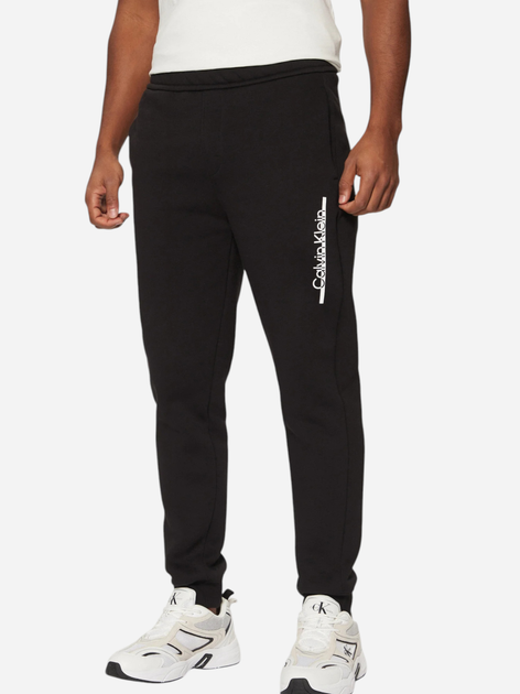 Spodnie sportowe męskie Calvin Klein K10K114342-BEH XL Czarne (8720639985142) - obraz 1