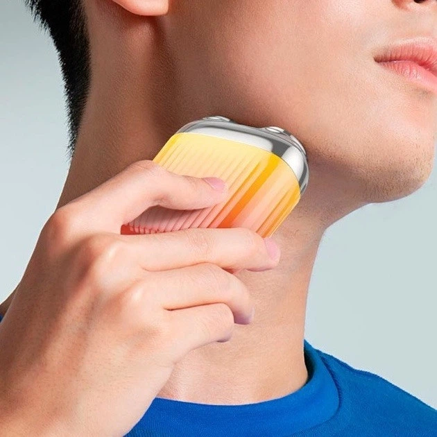 Портативная мужская роторная электробритва 3Вт HOCO Portable mini shaver DI30 IPX6 Оранжевая - изображение 4