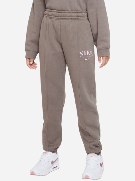 Spodnie dresowe dziewczęce ocieplane Nike G Nsw Trend Flc Cf Pant DZ4616-040 XS (122-128 cm) Brązowe - obraz 1