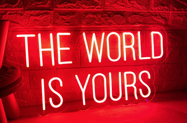 Мотивационная неоновая вывеска «The world is yours» 55х28 см - Фото 1 Мотивационная неоновая вывеска «The world is yours» 55х28 см - изображение 1