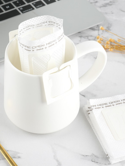 Дріп пакети для кави фільтр для заварювання пакетики drip bag filters порційні кавові фільтри порожні одноразові з вушками на чашку 49 шт паперові біорозкладні в чашці швидке заварювання вдома в офісі в дорозі компактні зручні для чаю в упаковці - зображення 5