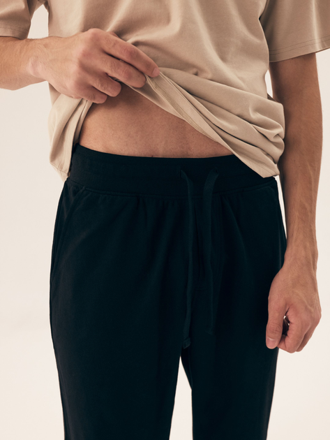 Spodnie joggery męskie Henderson Motion 43039-99X L Czarne - obraz 4