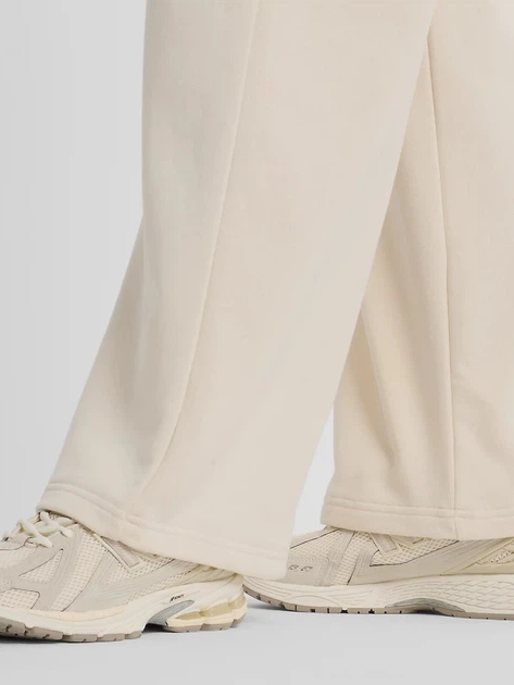 Спортивные штаны на флисе женские New Balance Coastal Fleece WP51503LIN S Бежевые (197967310959) - Фото 9 Спортивные штаны на флисе женские New Balance Coastal Fleece WP51503LIN S Бежевые (197967310959) - изображение 9