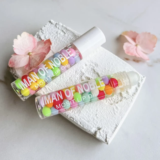 Блиск для губ кульковий фруктовий Iman of Noble Lip Gloss - Фото 1 Блиск для губ кульковий фруктовий Iman of Noble Lip Gloss - изображение 1