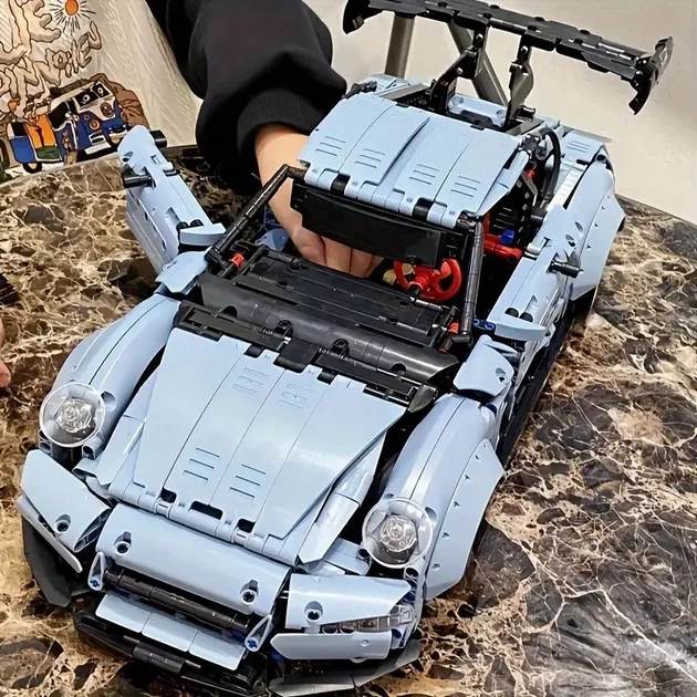 Конструктор Porsche Carrera на 2100 деталей в масштабе 1:14 коллекционный автомобиль - Фото 6 Конструктор Porsche Carrera на 2100 деталей в масштабе 1:14 коллекционный автомобиль - изображение 6