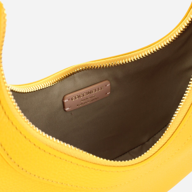 Torebka crossbody damska skórzana Coccinelle Whisper E5PIP530101-J19 Żółta - obraz 5