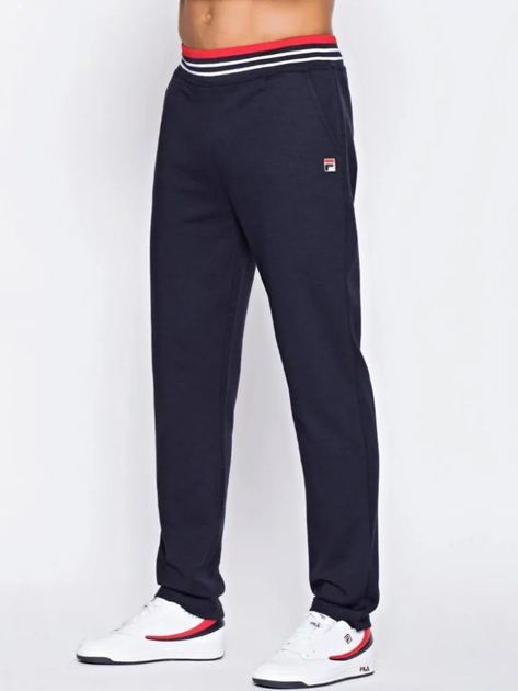 Spodnie dresowe męskie luźne Fila FAM0218-53068 XL Niebieskie (4064556276087) - obraz 1