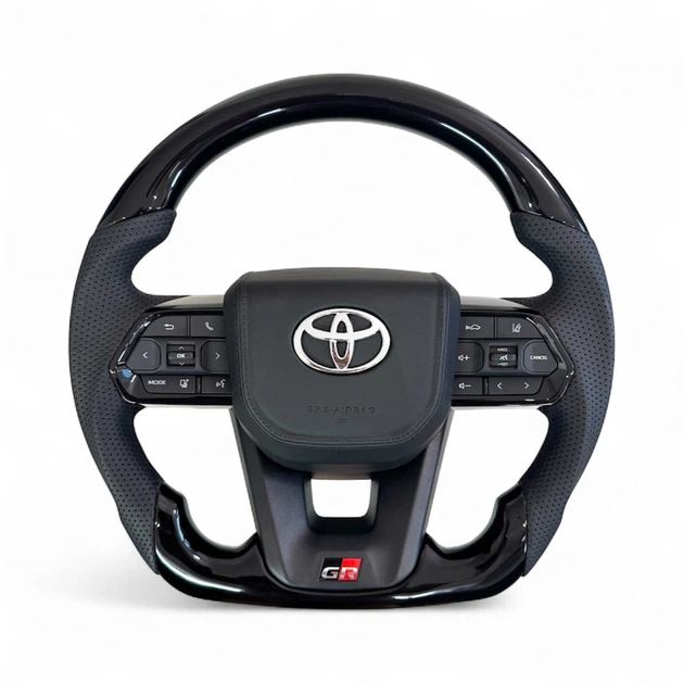 Анатомический руль для Toyota Land Cruiser 100, Prado 120. GR. Рояльный лак. Подушка из кожи - логотип хром. - Фото 1 Анатомический руль для Toyota Land Cruiser 100, Prado 120. GR. Рояльный лак. Подушка из кожи - логотип хром. - изображение 1