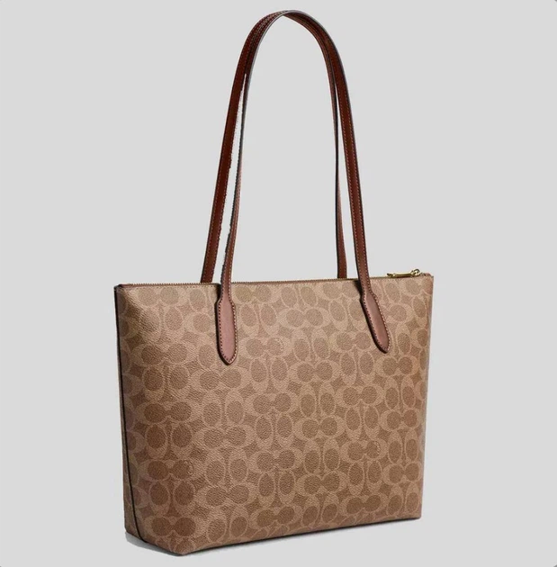 バッグ Coach Signature Brown Tote w/ Charm Жіноча сумка Coach Zip Top Tote Bag In Signature Canvas Tan/Brown