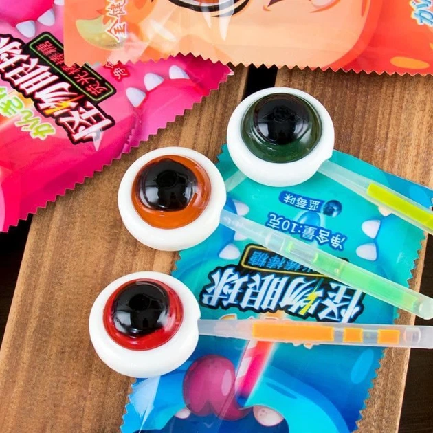 Конфета-леденец SSNS Halloween Glow Bone Eye Lollipop Candy со светящимся эффектом 10г - Фото 8 Конфета-леденец SSNS Halloween Glow Bone Eye Lollipop Candy со светящимся эффектом 10г - изображение 8