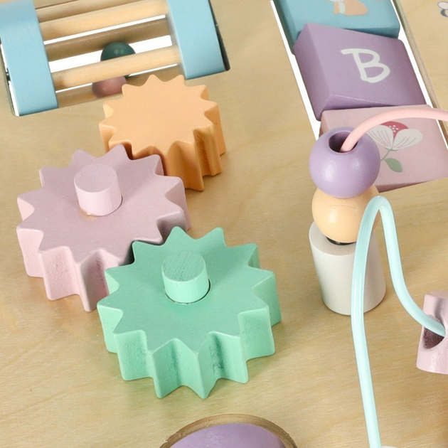 Drewniany stolik edukacyjny Ikonka LULILO LUDO sensoryczny 2w1 różowy (5903039751026) - obraz 6