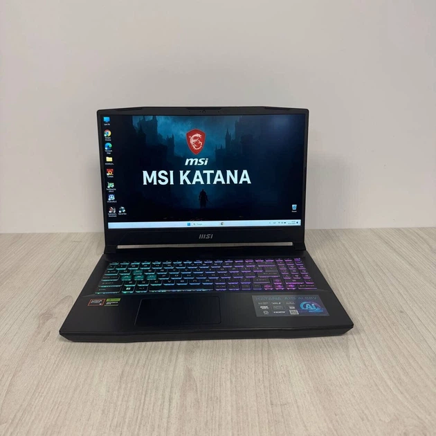 Игровой ноутбук MSI Katana A15 AI B8VG / 15.6" (1920x1080) IPS / AMD Ryzen 9 8945HS (8 (16) ядер по 4.0 – 5.2 GHz) / 16 GB DDR5 / 1000 GB SSD / nVidia GeForce RTX 4070, 8 GB GDDR6, 128-bit / WebCam б/у - Фото 2 Игровой ноутбук MSI Katana A15 AI B8VG / 15.6" (1920x1080) IPS / AMD Ryzen 9 8945HS (8 (16) ядер по 4.0 – 5.2 GHz) / 16 GB DDR5 / 1000 GB SSD / nVidia GeForce RTX 4070, 8 GB GDDR6, 128-bit / WebCam б/у - изображение 2