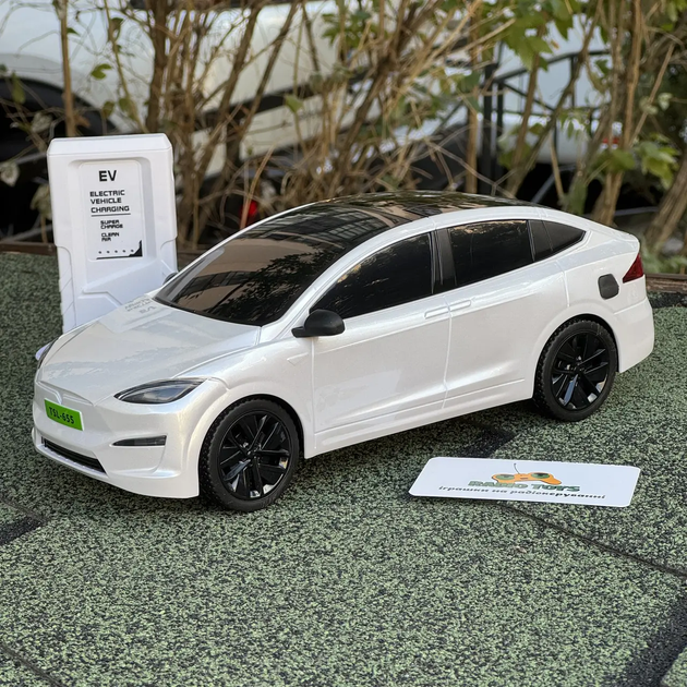 Інерційна металопластикова машинка PM3417 Tesla Model Х на радіокеруванні з зарядною станцією Біла - Фото 2 Інерційна металопластикова машинка PM3417 Tesla Model Х на радіокеруванні з зарядною станцією Біла - зображення 2