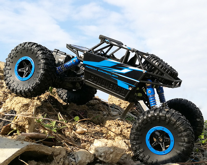 Машинка на радиоуправлении джип-вездеход HB Toys Rock Through на амортизаторах полноприводная с протекторами и большими резиновыми колесами Синий - Фото 7 Машинка на радиоуправлении джип-вездеход HB Toys Rock Through на амортизаторах полноприводная с протекторами и большими резиновыми колесами Синий - изображение 7