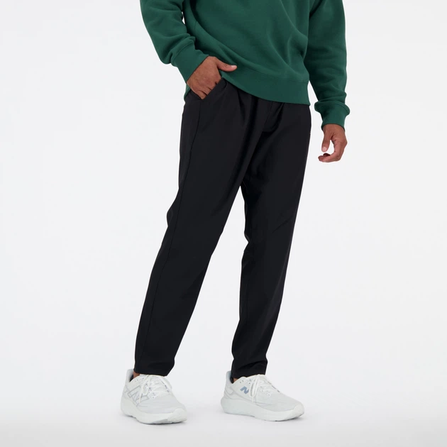 Мужские черные спортивные брюки New Balance AC Stetch Woven 52 (XL) (MP41060BK) - Фото 1 Мужские черные спортивные брюки New Balance AC Stetch Woven 52 (XL) (MP41060BK) - изображение 1